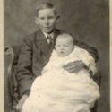 Portrait of Carl Poague and Baby Inez Hannah
