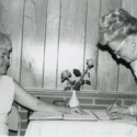 Jerry Jett watches Marie Leist Sign Guest Book at Pearl S. Buck Visit in Marlinton, W.Va. 1971